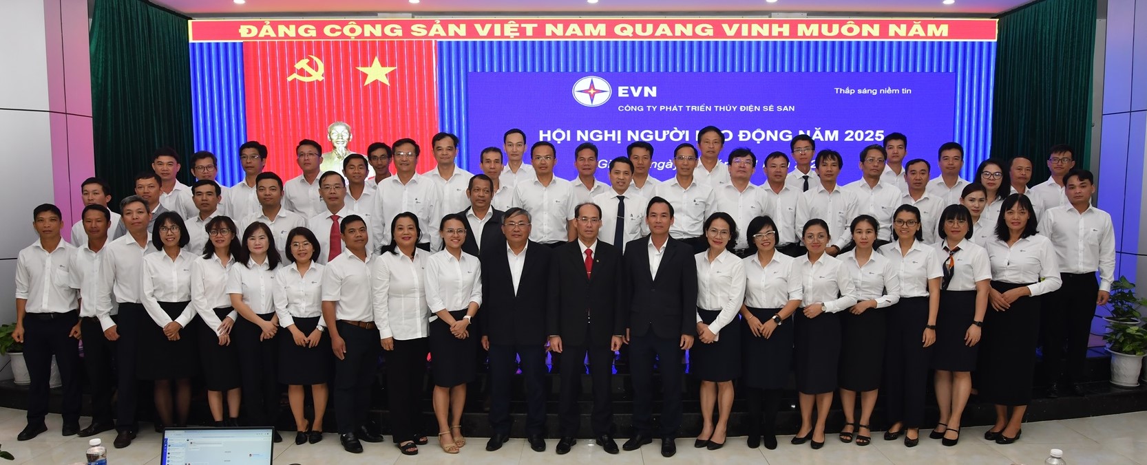 A group of people in white shirts and black skirtsDescription automatically generated